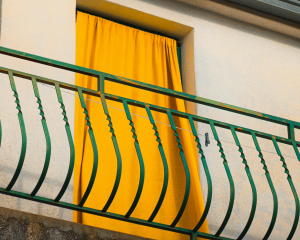 No-drill privacy curtain setup for a small apartment balcony, renter-friendly solution