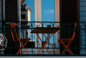 Budget patio furniture for small spaces and tiny balconies - cozy outdoor setup with folding chairs and compact tables
