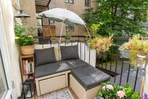 Storage-integrated patio setup with multi-purpose bench
