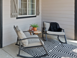 Modern minimalist patio setup with neutral furniture
