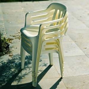 durable stackable HDPE chairs on small balcony for small space patio furniture