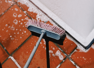 Scrubbing concrete patio with Dawn